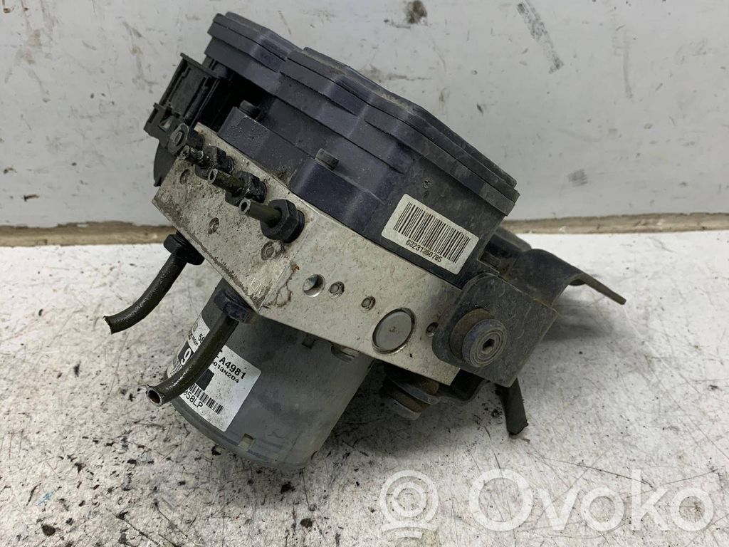 KIA Carens III ABS Blokas 