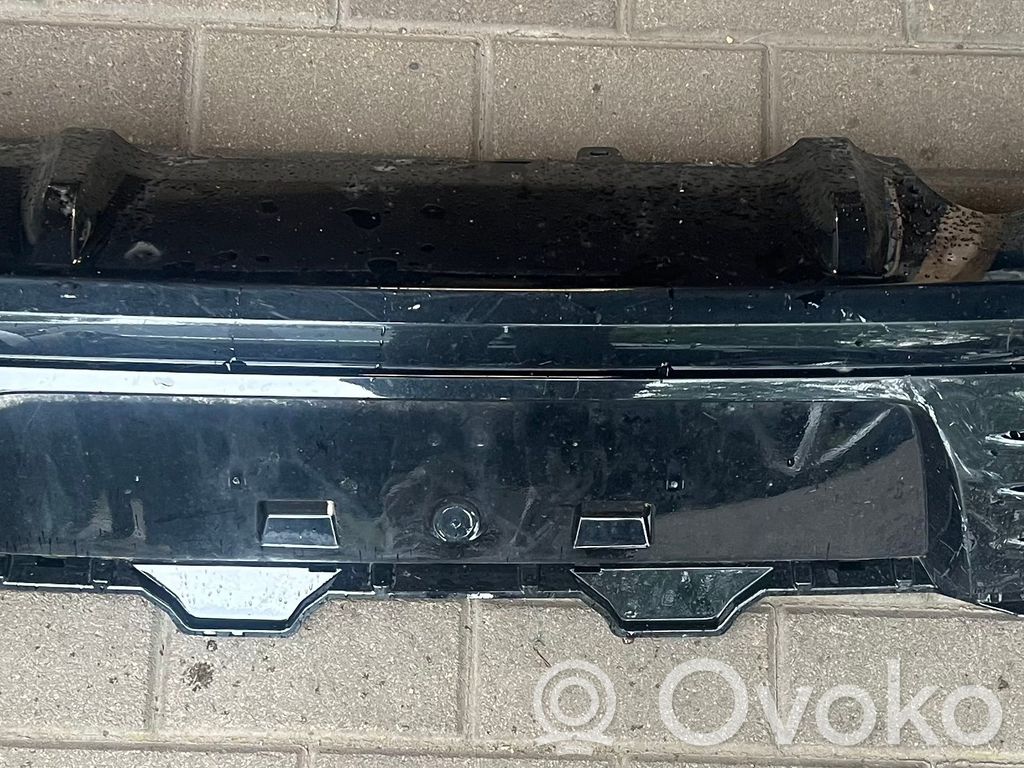 Renault Clio IV Moldura inferior del parachoques trasero 
