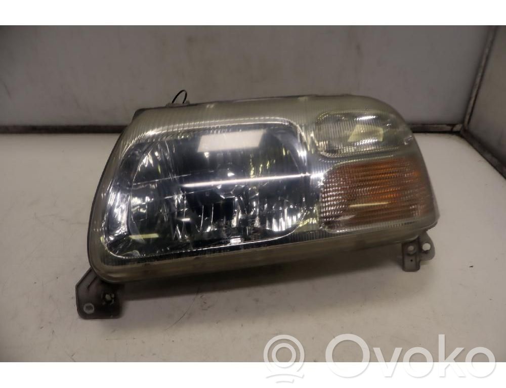 Suzuki Grand Vitara I Lampa przednia 