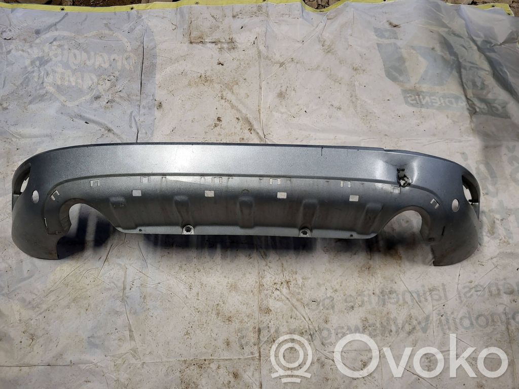 Volvo XC60 Moldura inferior del parachoques trasero 