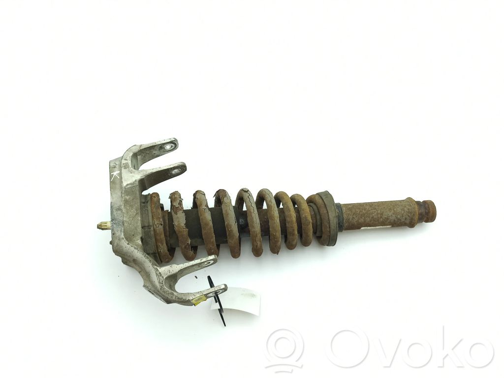 Cadillac SRX Front shock absorber with coil spring 