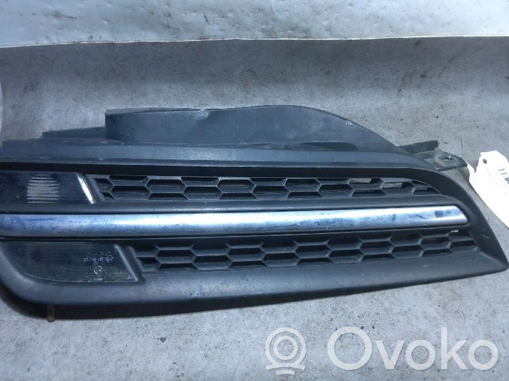 Nissan Micra Front bumper upper radiator grill 