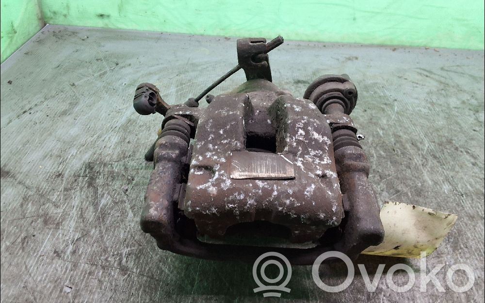 Citroen C4 I Picasso Tylny zacisk hamulcowy 