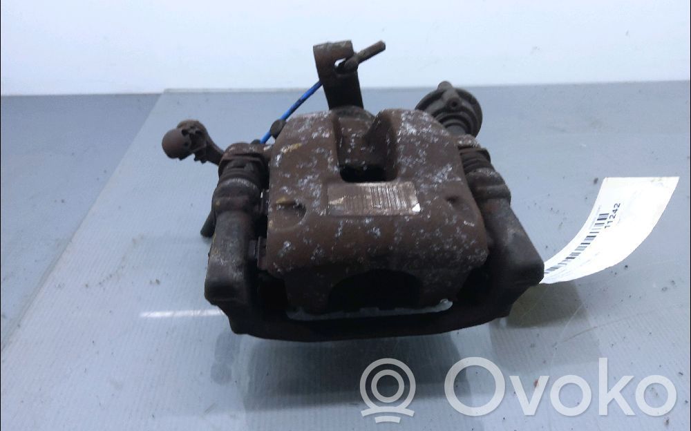 Citroen C4 I Picasso Tylny zacisk hamulcowy 