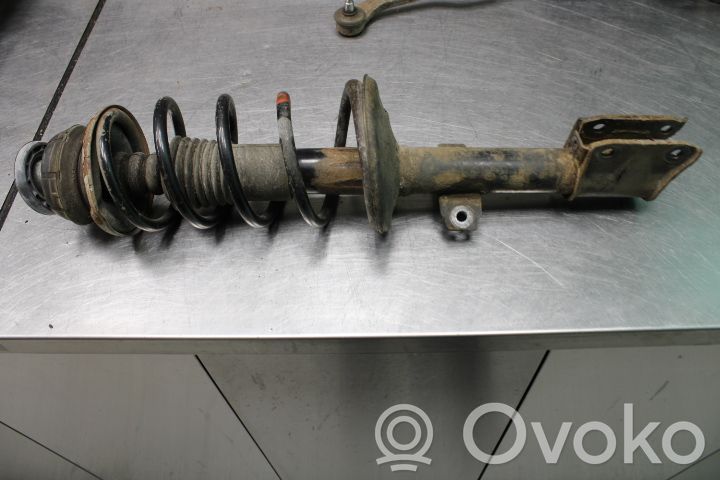 Front shock absorber with coil spring