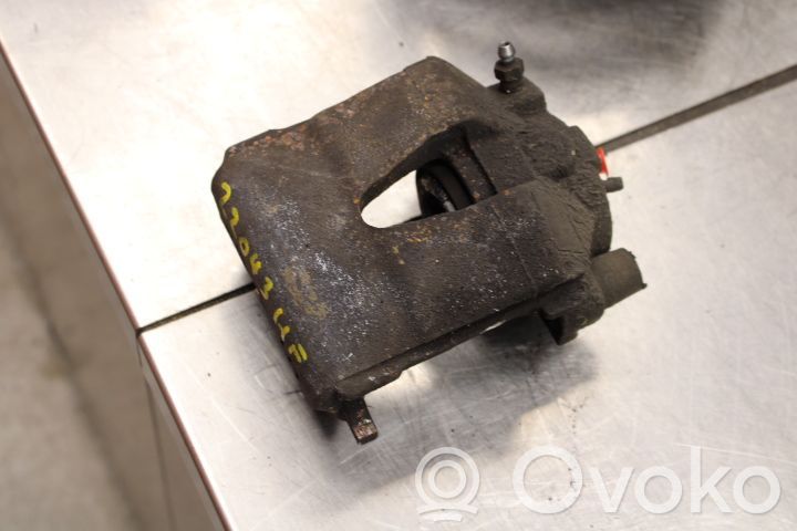Volkswagen Golf VII Zacisk hamulcowy przedni 
