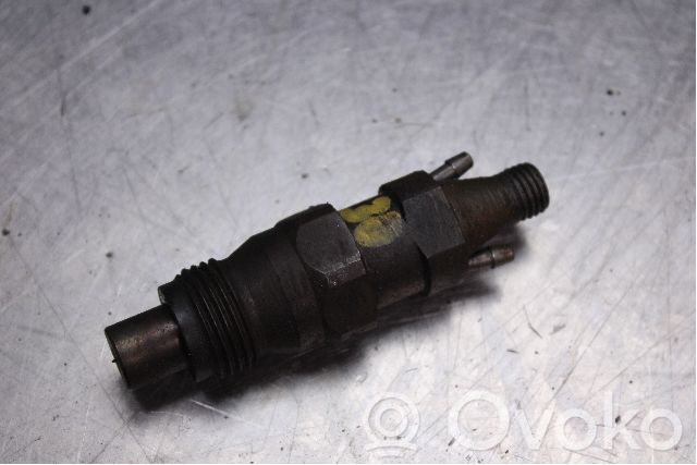 Inyector de combustible