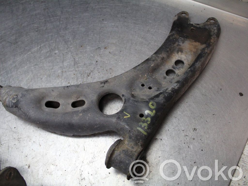 Volkswagen Caddy Dolny wahacz przedni 