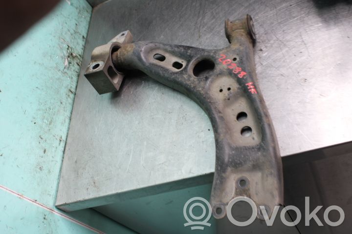 Volkswagen PASSAT B7 Braccio di controllo sospensione anteriore inferiore/braccio oscillante 