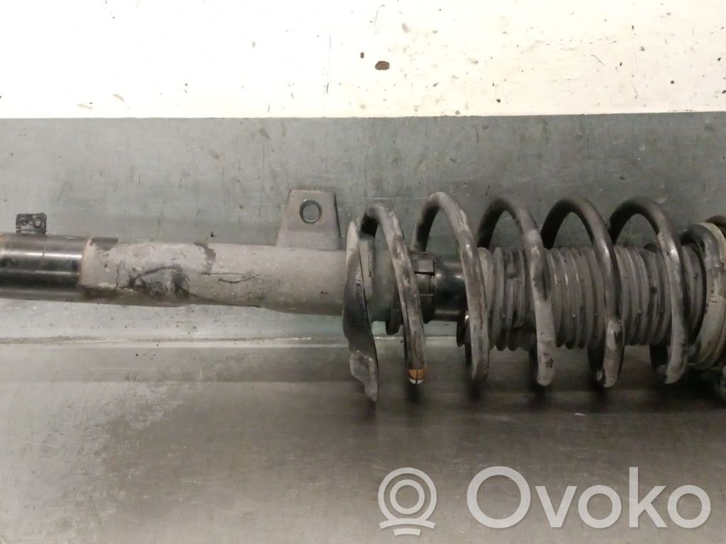 Volkswagen Caddy Amortyzator osi przedniej ze sprężyną