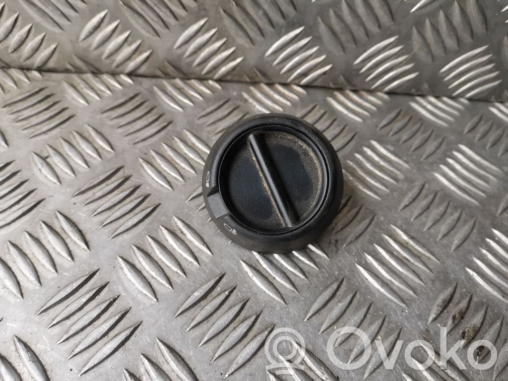 Headlight level height control switch   7700352939