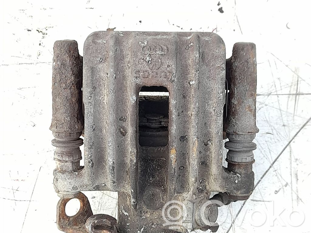 Volkswagen Golf IV Tylny zacisk hamulcowy 