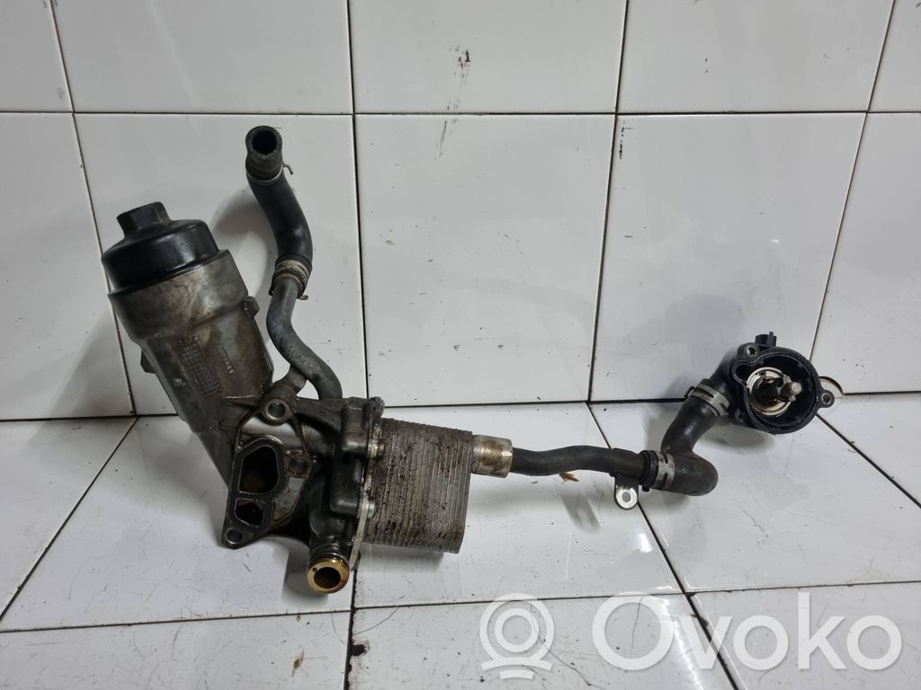 Opel Astra J Mocowanie / uchwyt filtra oleju 