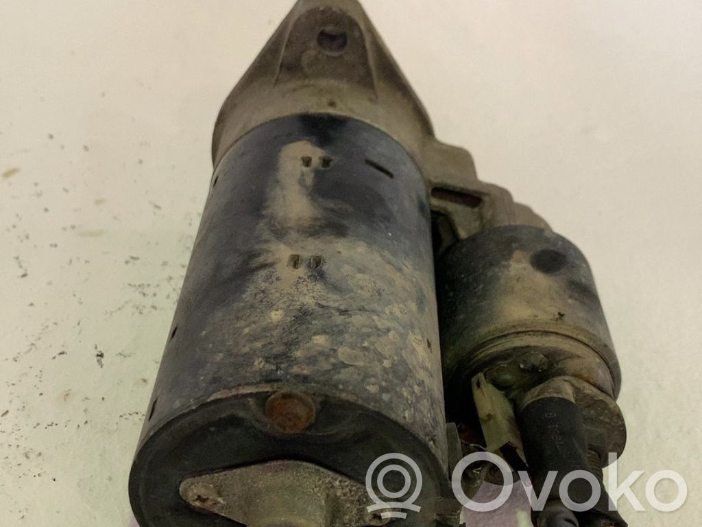 Electromotor   06B911023