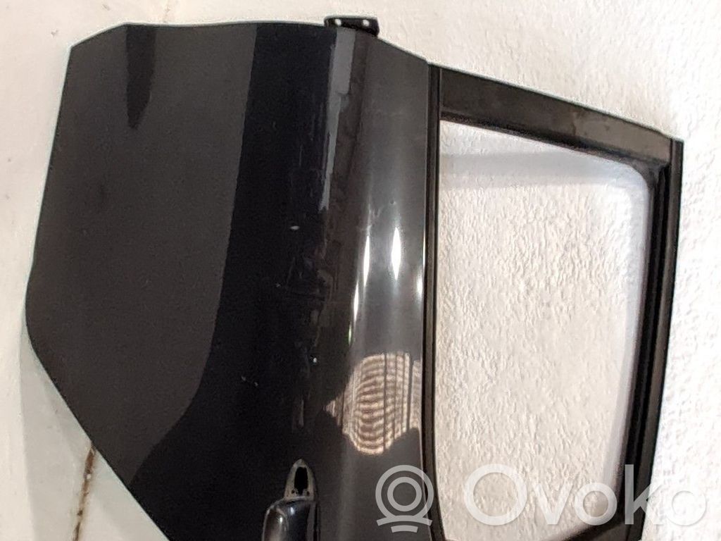 Puerta trasera   77003A2000