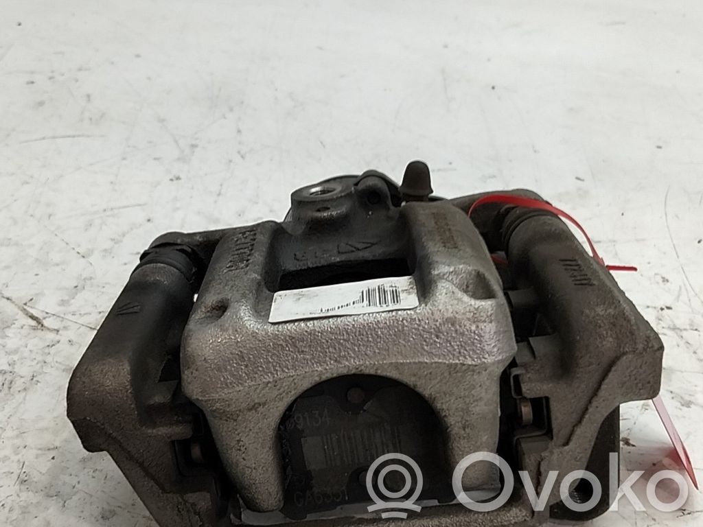 Opel Corsa F Tylny zacisk hamulcowy 