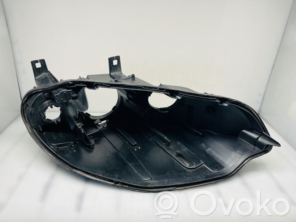Headlight part   16635400R