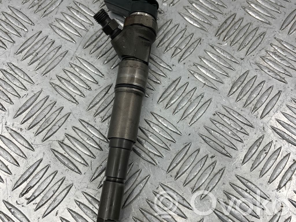 Fuel injector   7788812