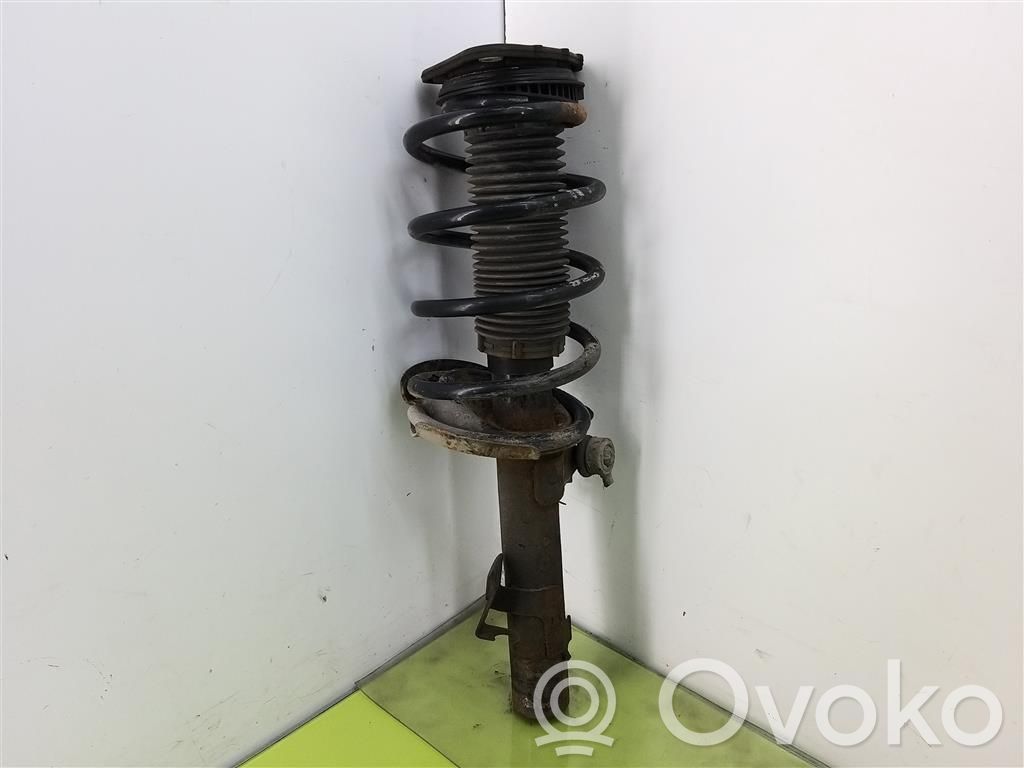 Front shock absorber with coil spring