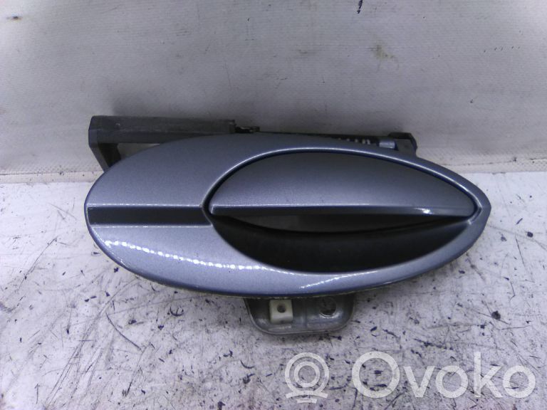 Manecilla externa puerta delantera
