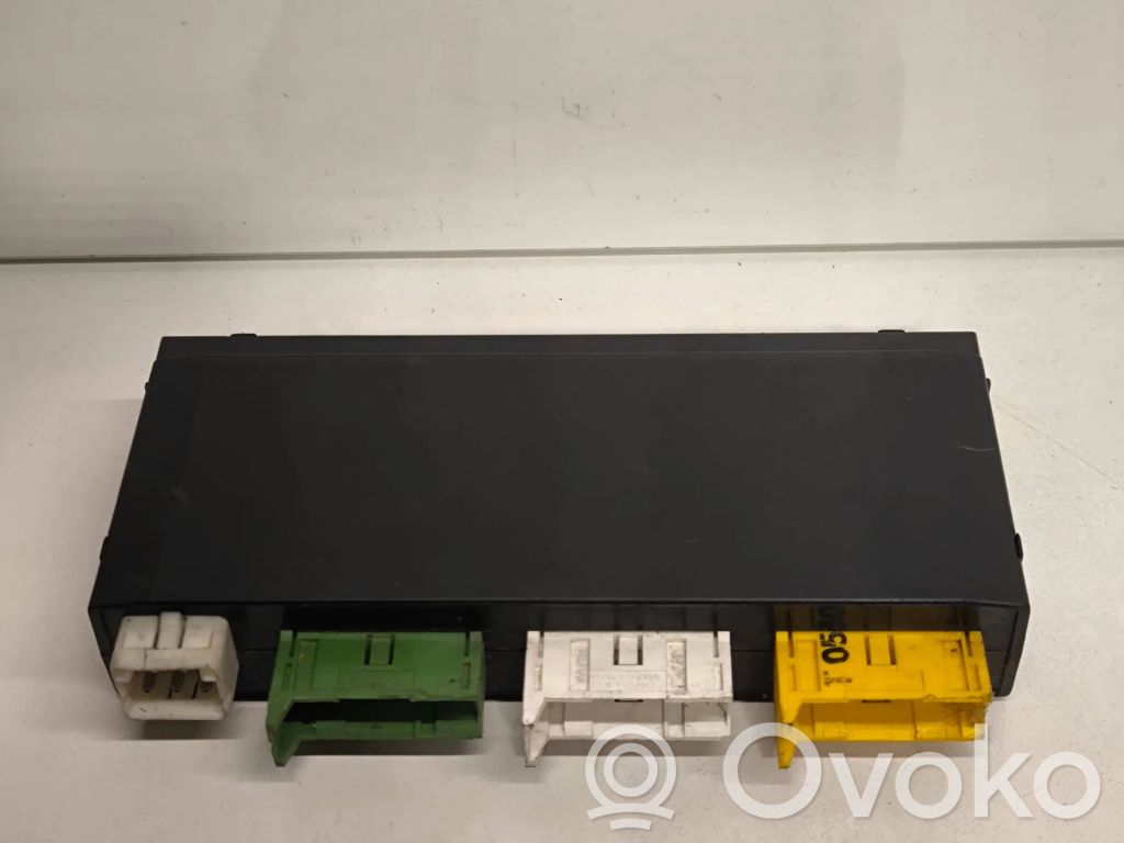 BMW 5 E34 Komforto modulis 