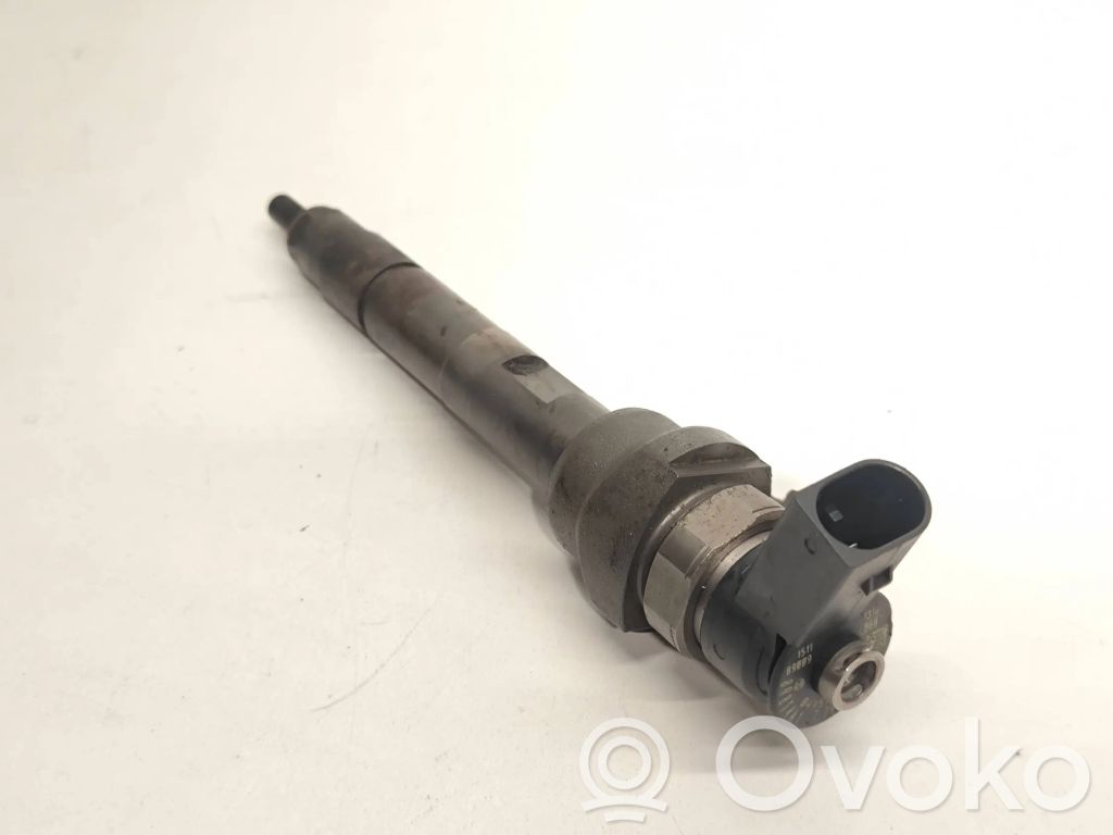 Fuel injector   7798446