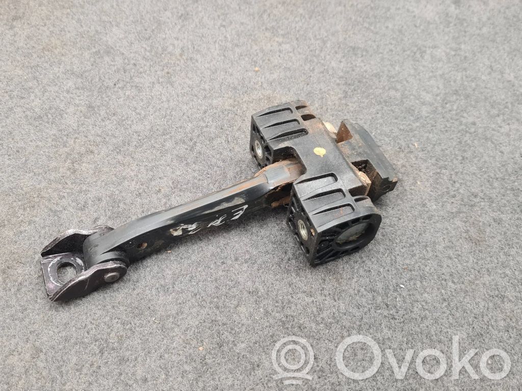 Front door check strap stopper   7060200
