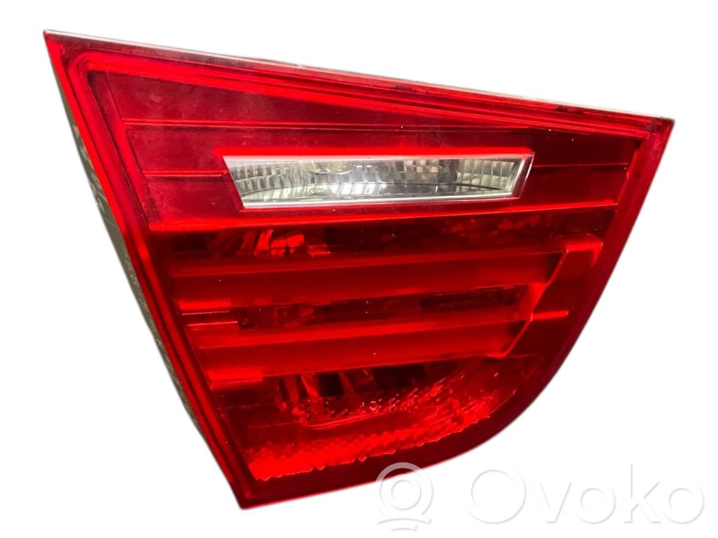 BMW 3 E90 E91 Aizmugurējais lukturis pārsegā 