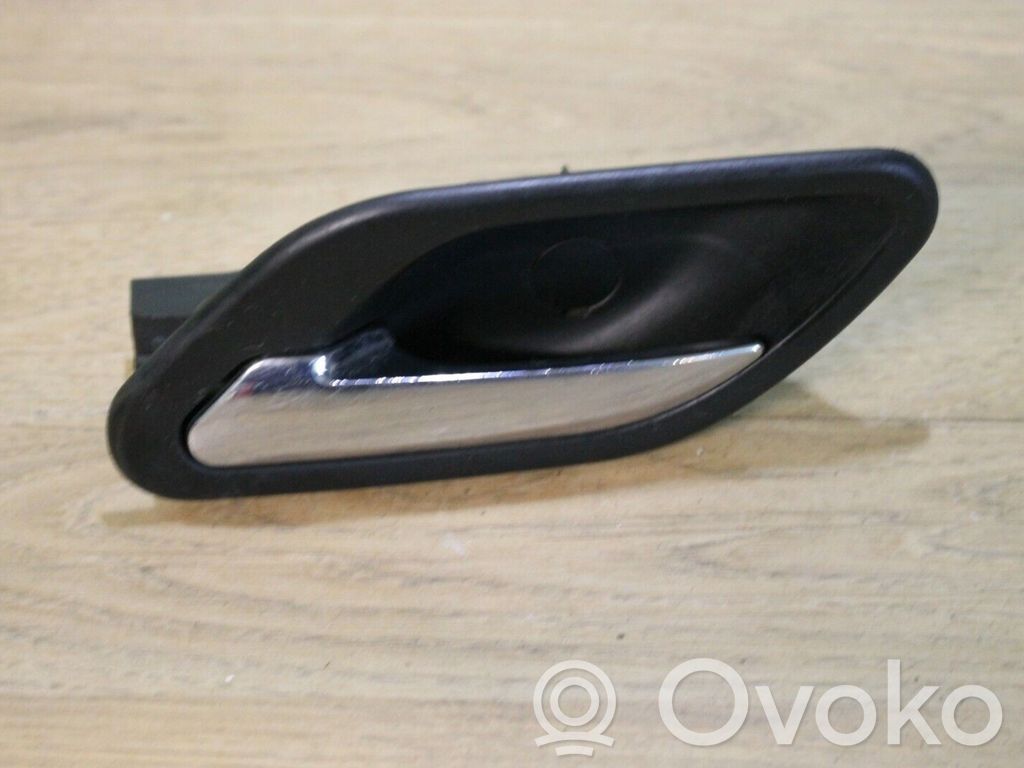 Front door interior handle   7032925