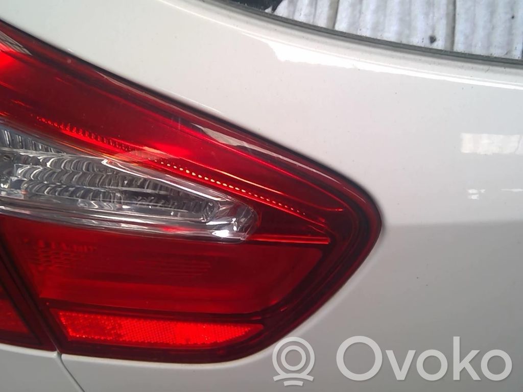 KIA Rio Galinis žibintas dangtyje 