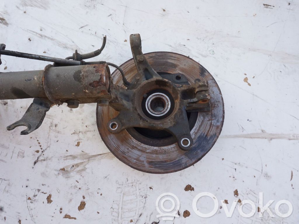 Front wheel hub spindle knuckle