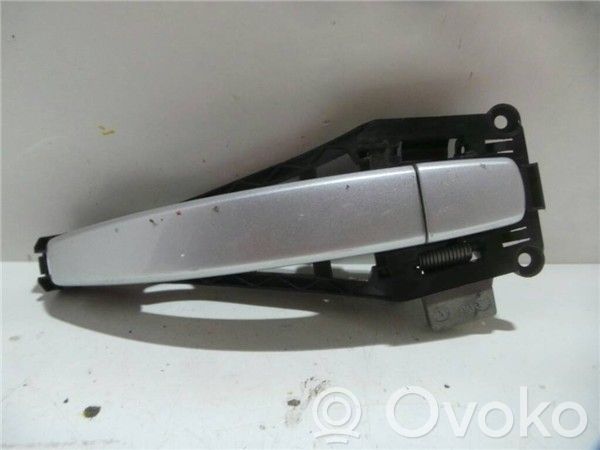 Opel Astra H Front door exterior handle 