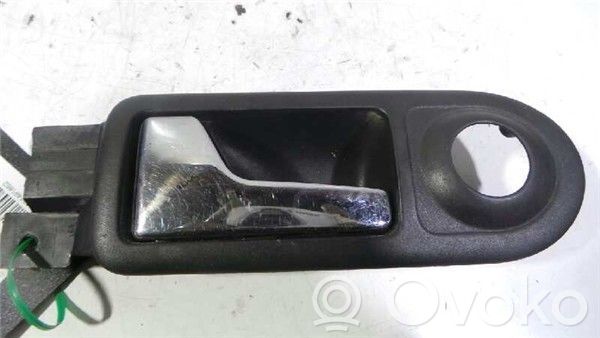 Volkswagen Golf V Front door interior handle 