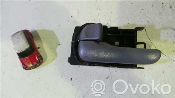 Nissan Almera N16 Iekšējais atvēršanas rokturītis 