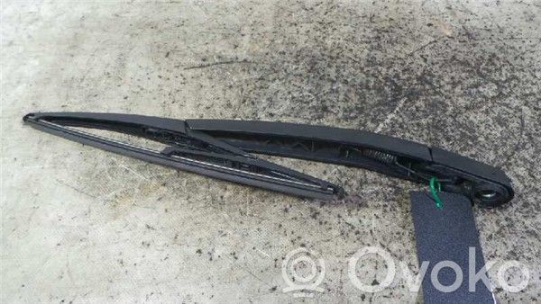Opel Corsa D Aizmugurējā loga tīrītāja kājiņa 