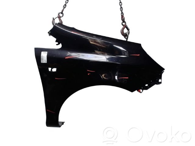 Opel Corsa D Błotnik przedni 