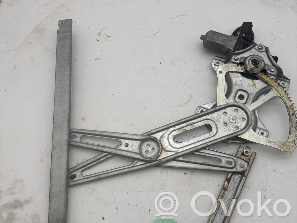 Toyota Yaris Elektryczny podnośnik szyby drzwi przednich 