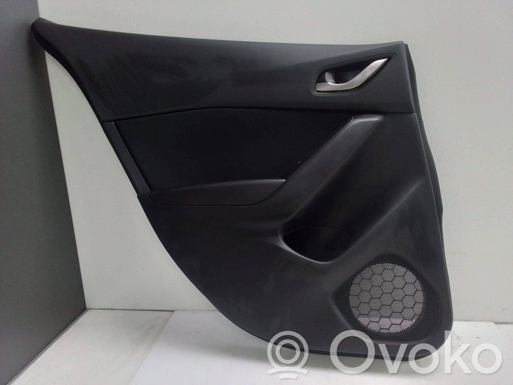 Mazda 3 II Moldura del tarjetero de la puerta trasera