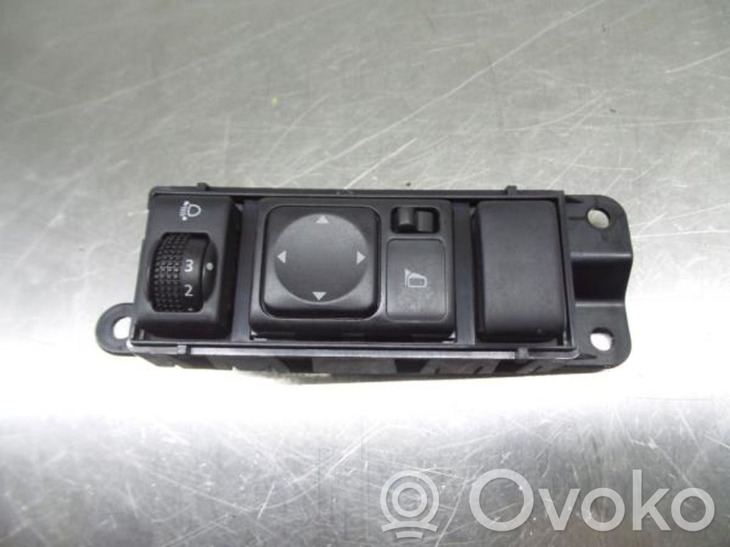 Nissan Juke I F15 Interruttore/pulsante di controllo multifunzione 