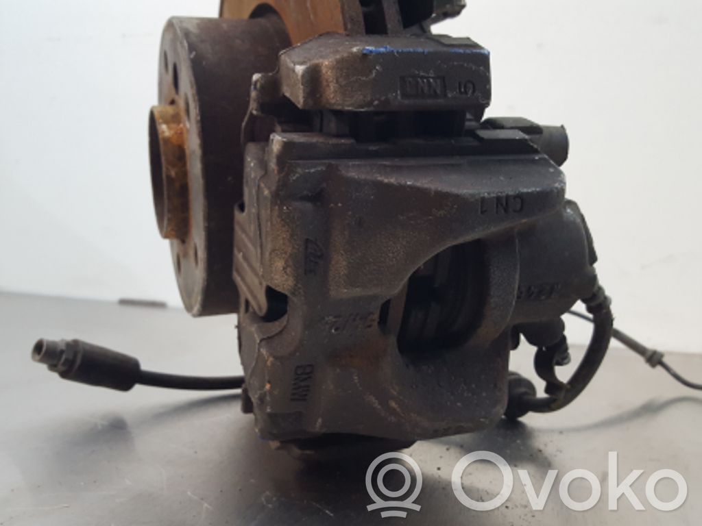 Front brake caliper   EM