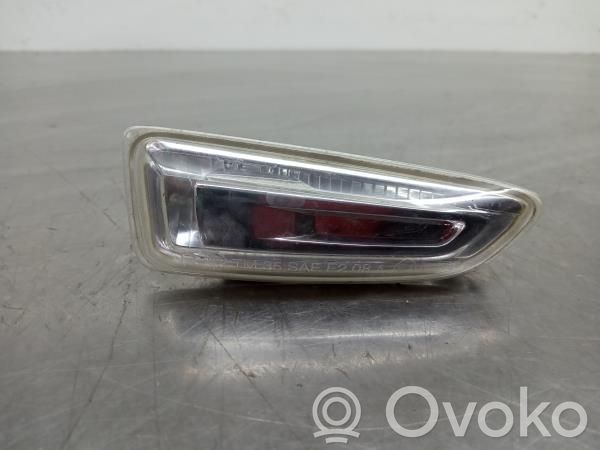 Opel Astra J Señal de giro del parachoques delantero 