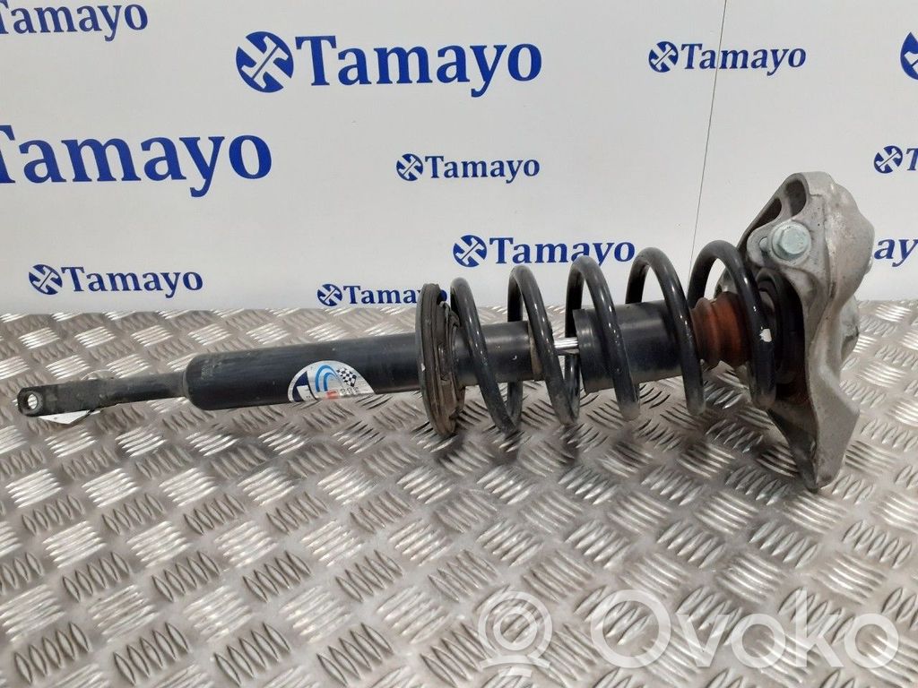 Front shock absorber with coil spring