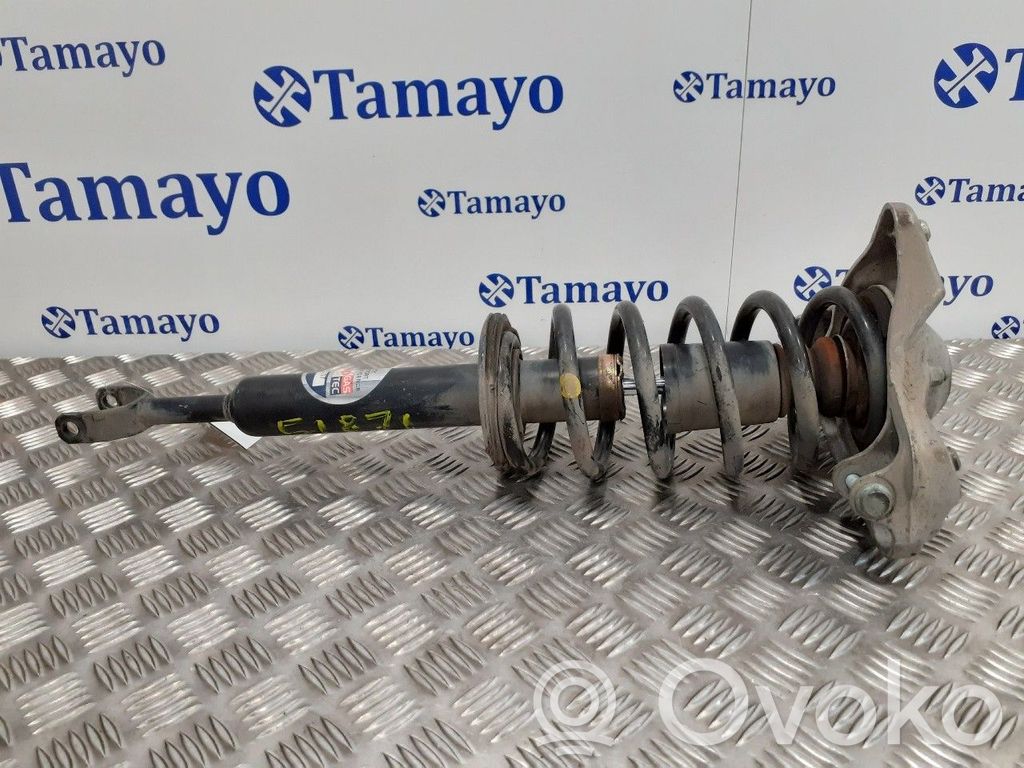 Front shock absorber with coil spring