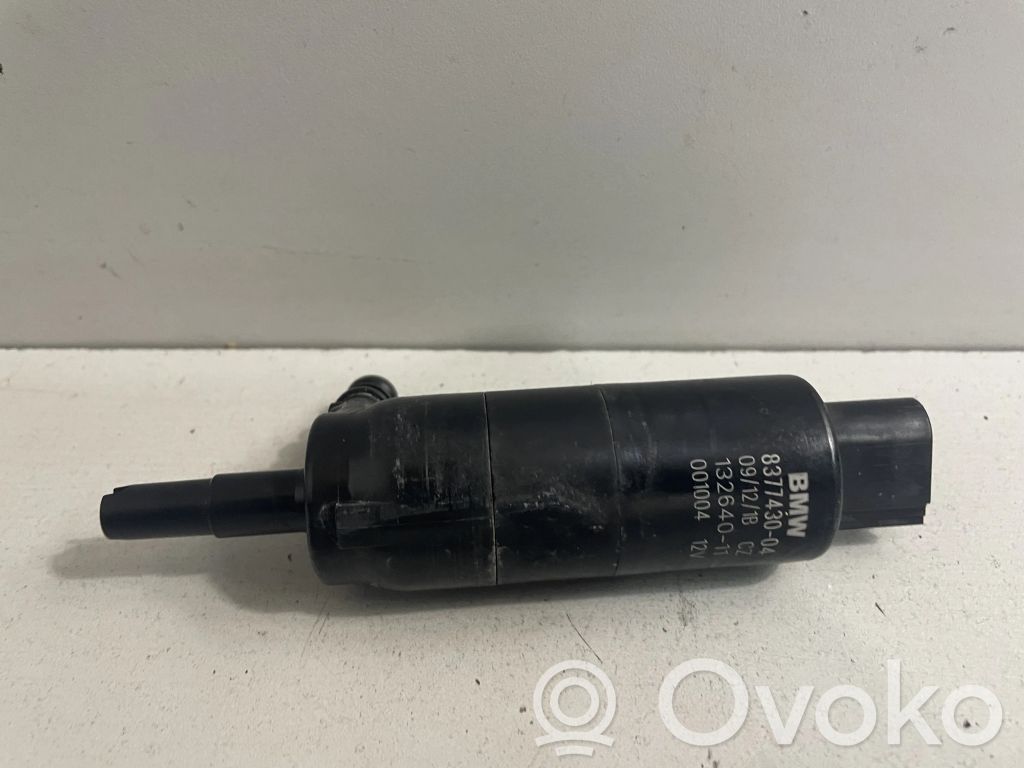 Headlight washer pump   8377430