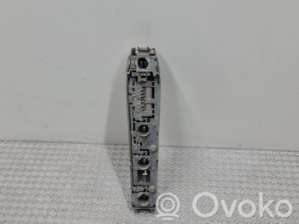 Ford Escort Aizmugures spuldzes vāka turētājs 
