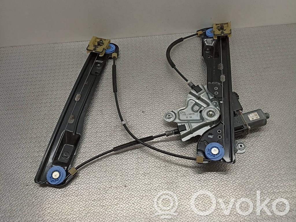 Opel Astra J Elektryczny podnośnik szyby drzwi przednich 
