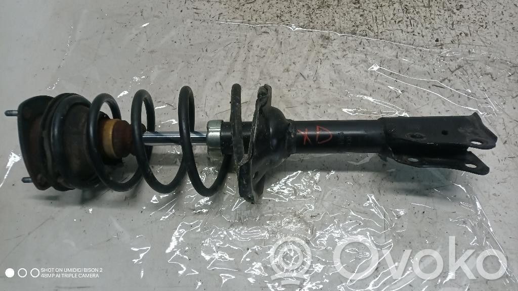 Toyota Yaris Amortyzator osi przedniej ze sprężyną 
