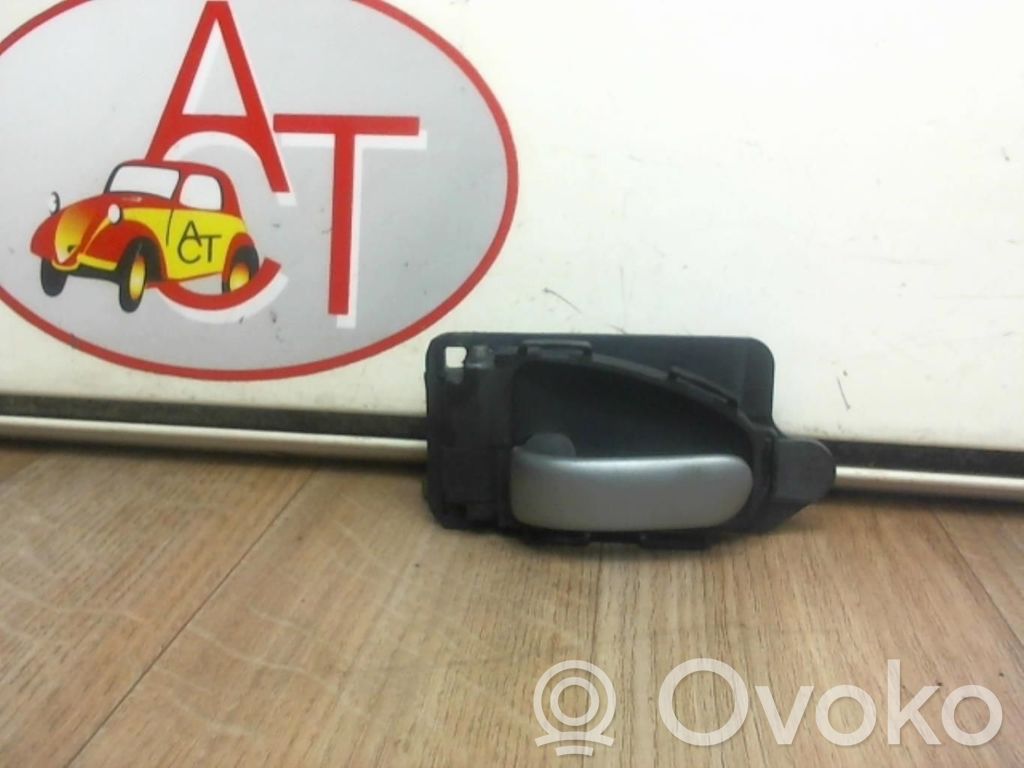 Manecilla interna puerta delantera   00009143R3,00009143R3