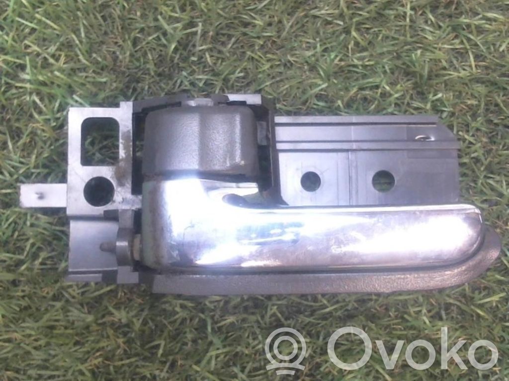 Rear door interior handle