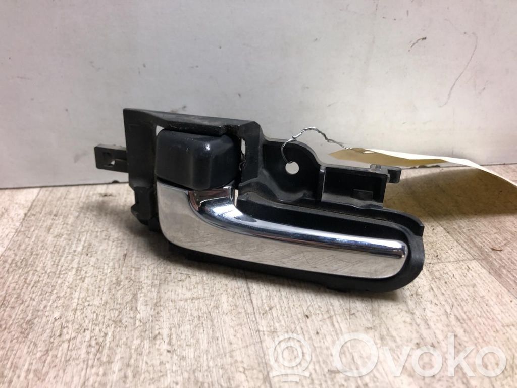 Daihatsu Cuore Manecilla interna puerta delantera 